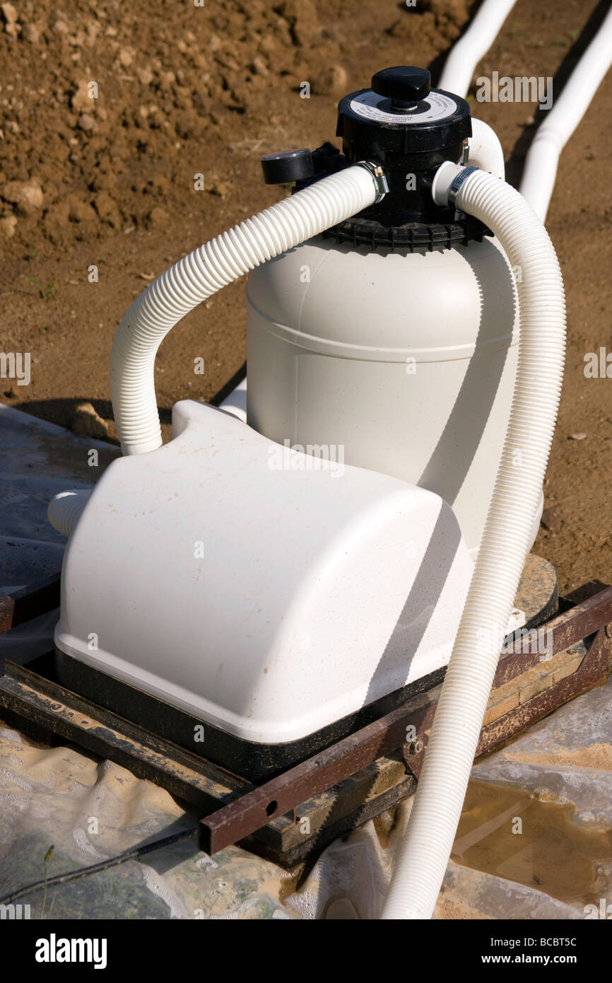 Small swimming pool water cleaning pump Stock Photo Alamy