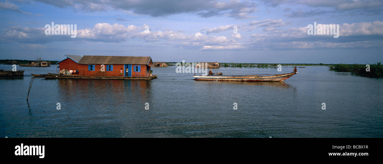 Cambodia, Siem Reap Province, Tonle Sap Lake, Chong Kneas, moving of a floating house Stock Photo