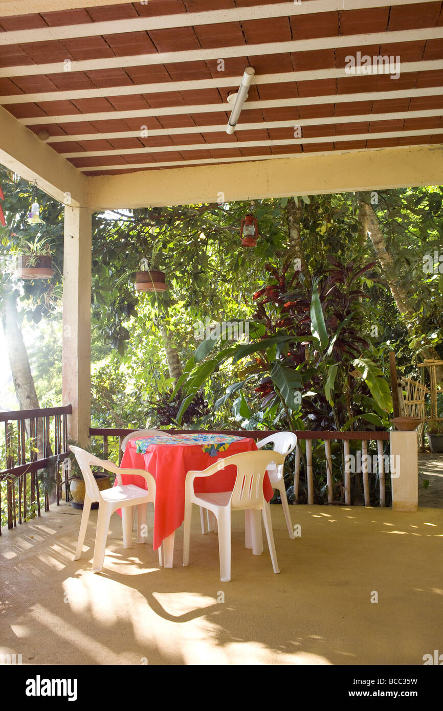 breakfast table on tropical veranda Stock Photo