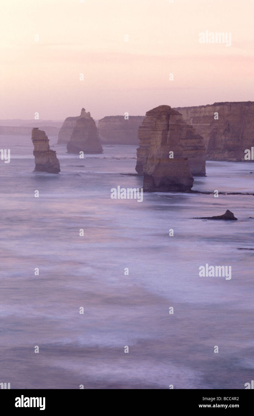 The impressive sandstone Twelve Apostles in a sunset afterglow. Stock Photo