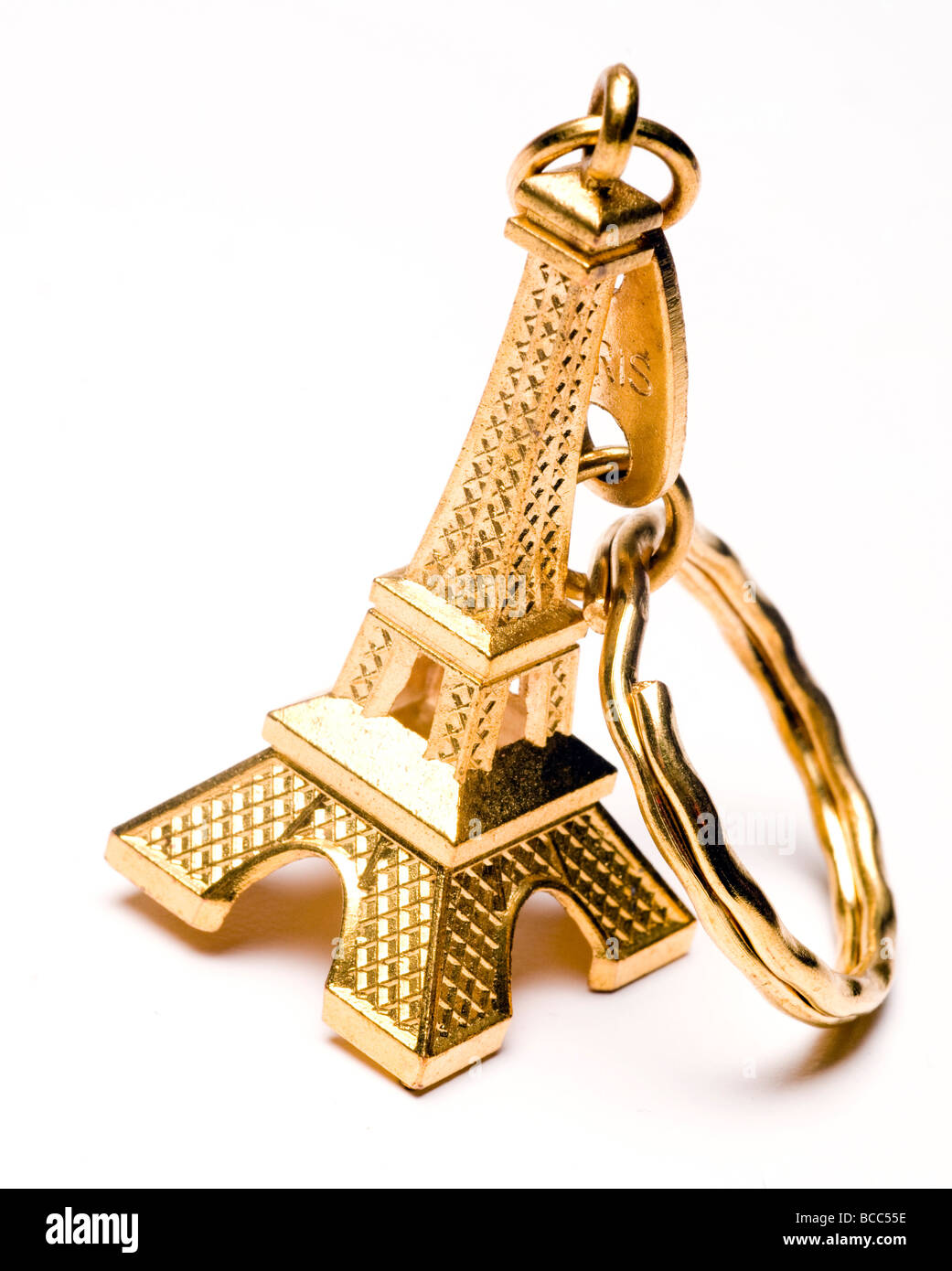 souvenir key chain of mini eiffel tower in gold from paris france Stock Photo