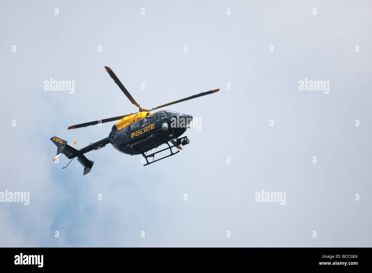 Metropolitan Police helicopter in flight above London Stock Photo