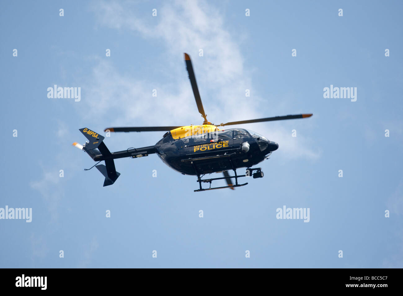 Metropolitan Police helicopter in flight above London Stock Photo