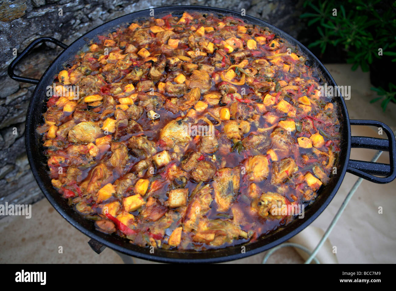 Cooking Paella Spanish Paella probably Spains most colourful and famous gastronomic delight. Spanish food. Stock Photo