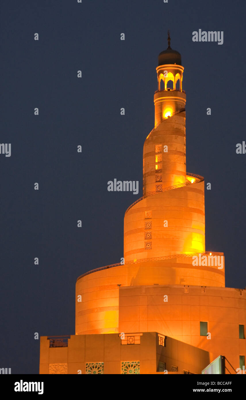 Doha, Qatar.  Kassem Darwish Fakhroo Centre, Headquarters of the Qatar Islamic Cultural Center.  Night Scene. Stock Photo