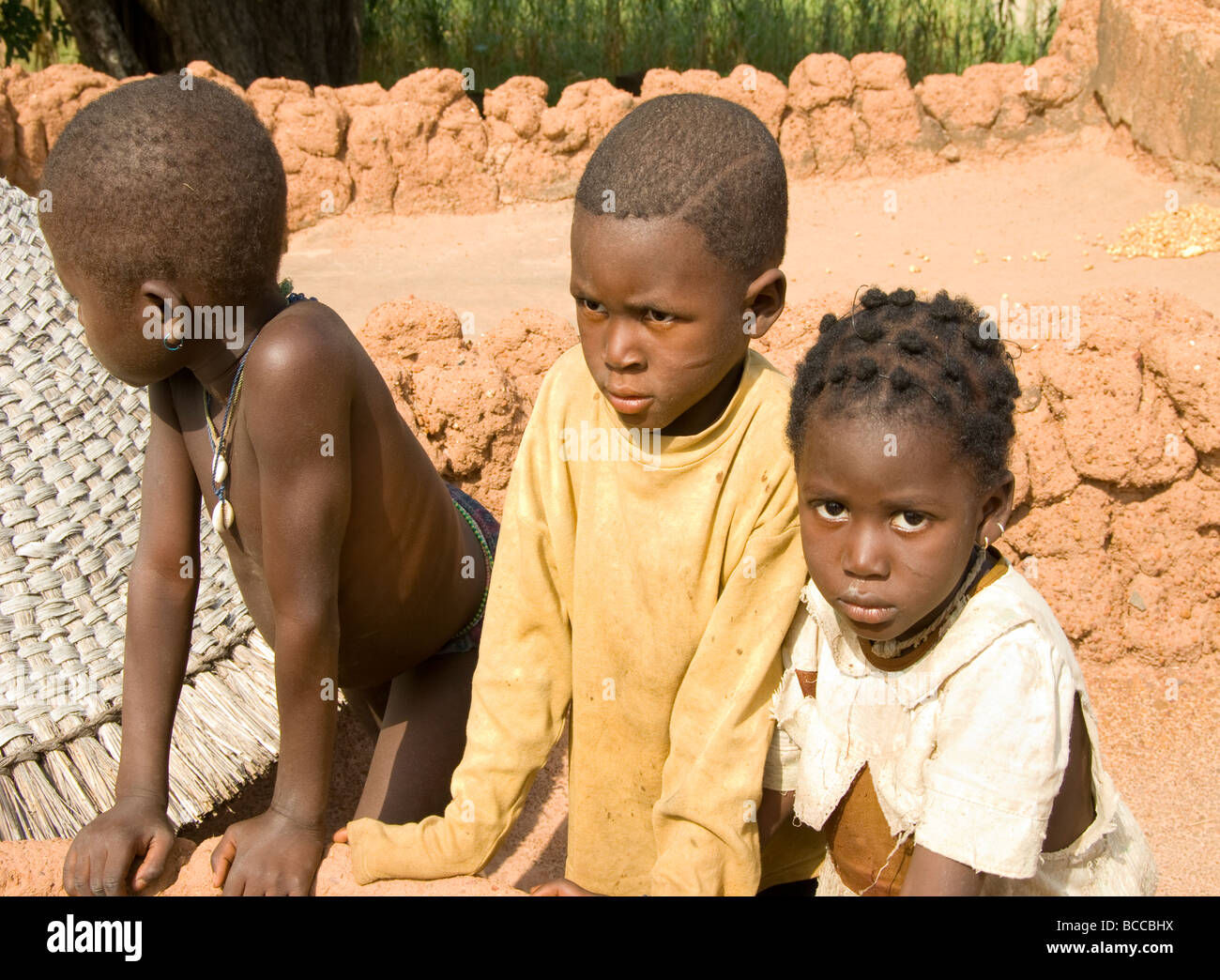 Burkina Faso. Lobi country. Children in the Sukala(traditional house). Stock Photo