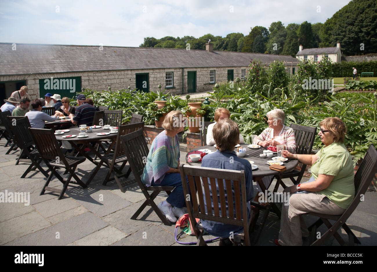 female tourists in the tearoom of the walled garden at Glenarm castle county antrim northern ireland uk Stock Photo