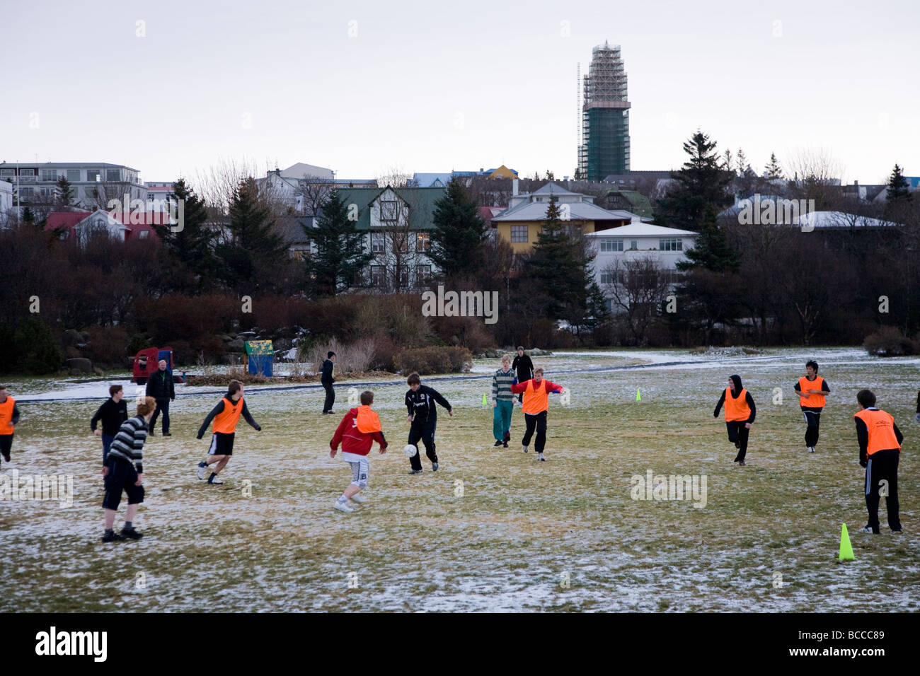 Schoolboys in college Menntaskolinn in Reykjavik playing soccer on a cold winter morning. Stock Photo