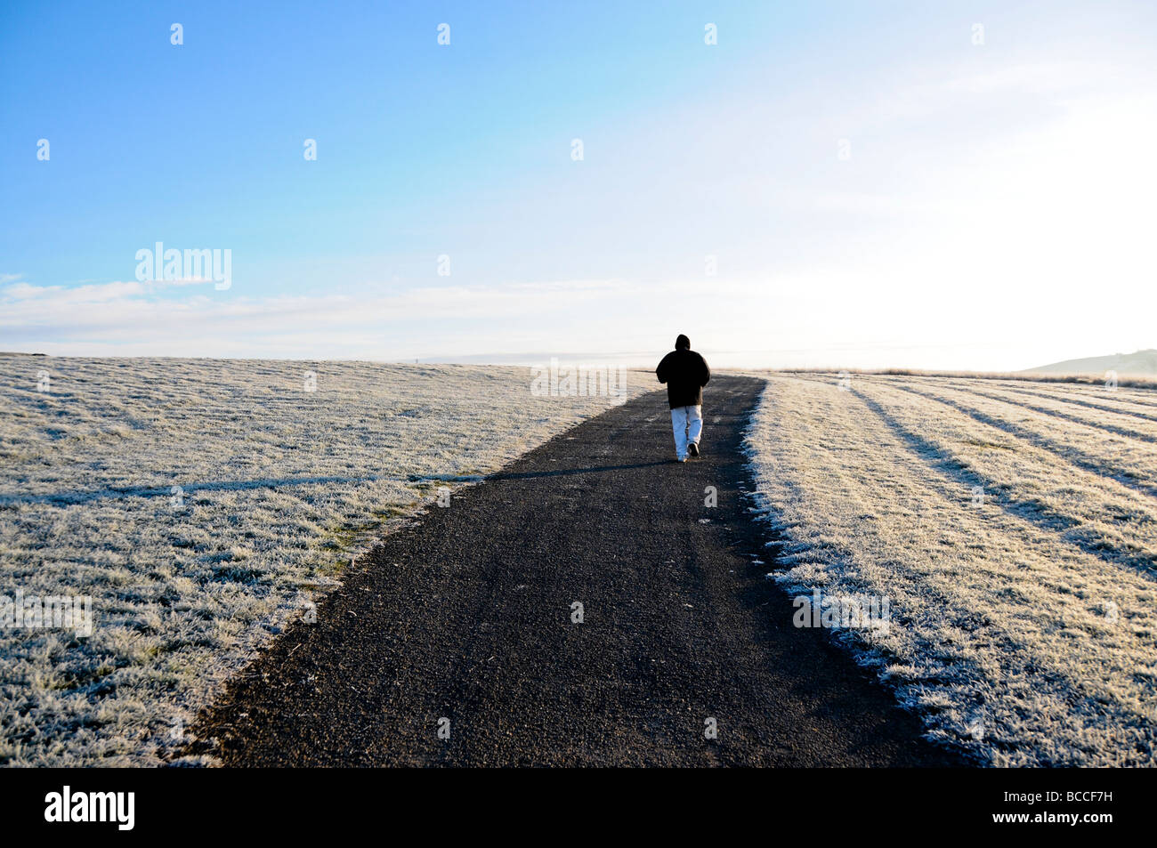 Remote man in snow landscape, sunderland england Stock Photo