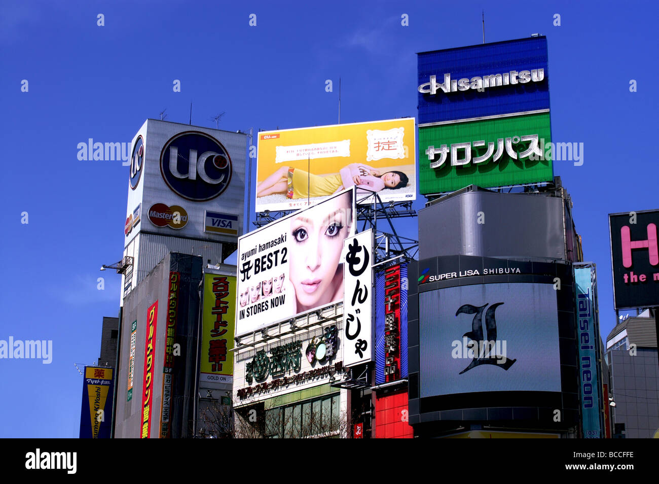 billboards and posters at Shibuya crossing in Tokyo, Japan. Stock Photo