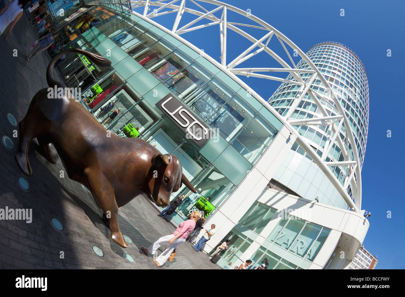 Bronze bull statue and Rotunda Building in Birmingham Bullring West