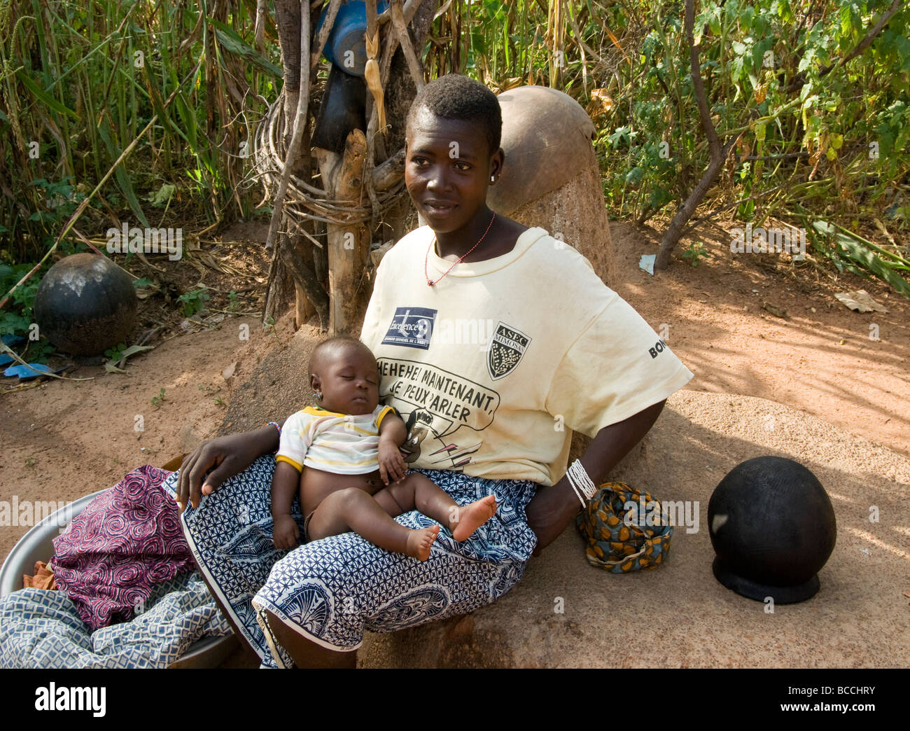 Burkina Faso. Lobi country. Baby with her mother. Stock Photo