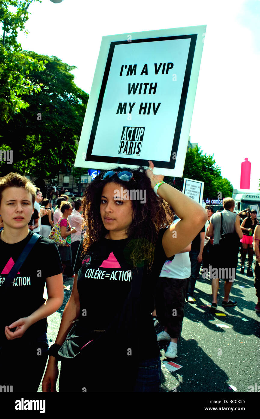 Paris France, Public Events, People Demonstrating at the 'Gay Pride' Parade 'Act Up' Anti hiv AIDS Female Activists Marching  Sign shirt woman slogan, Stock Photo