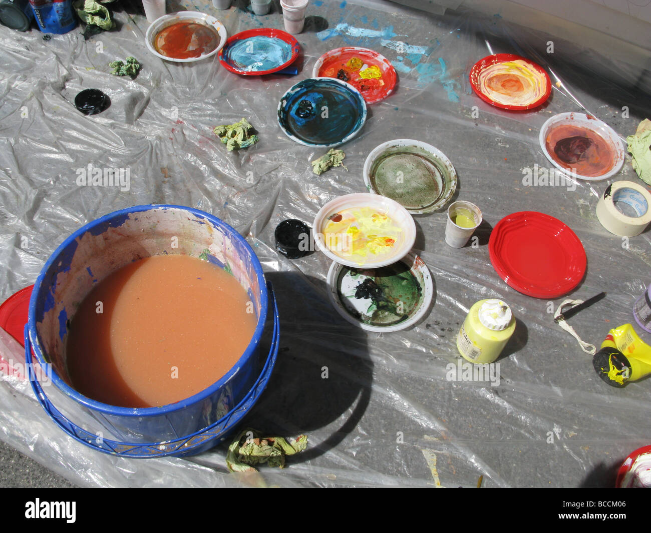 selection of paint palettes on floor in artist's studio Stock Photo Alamy