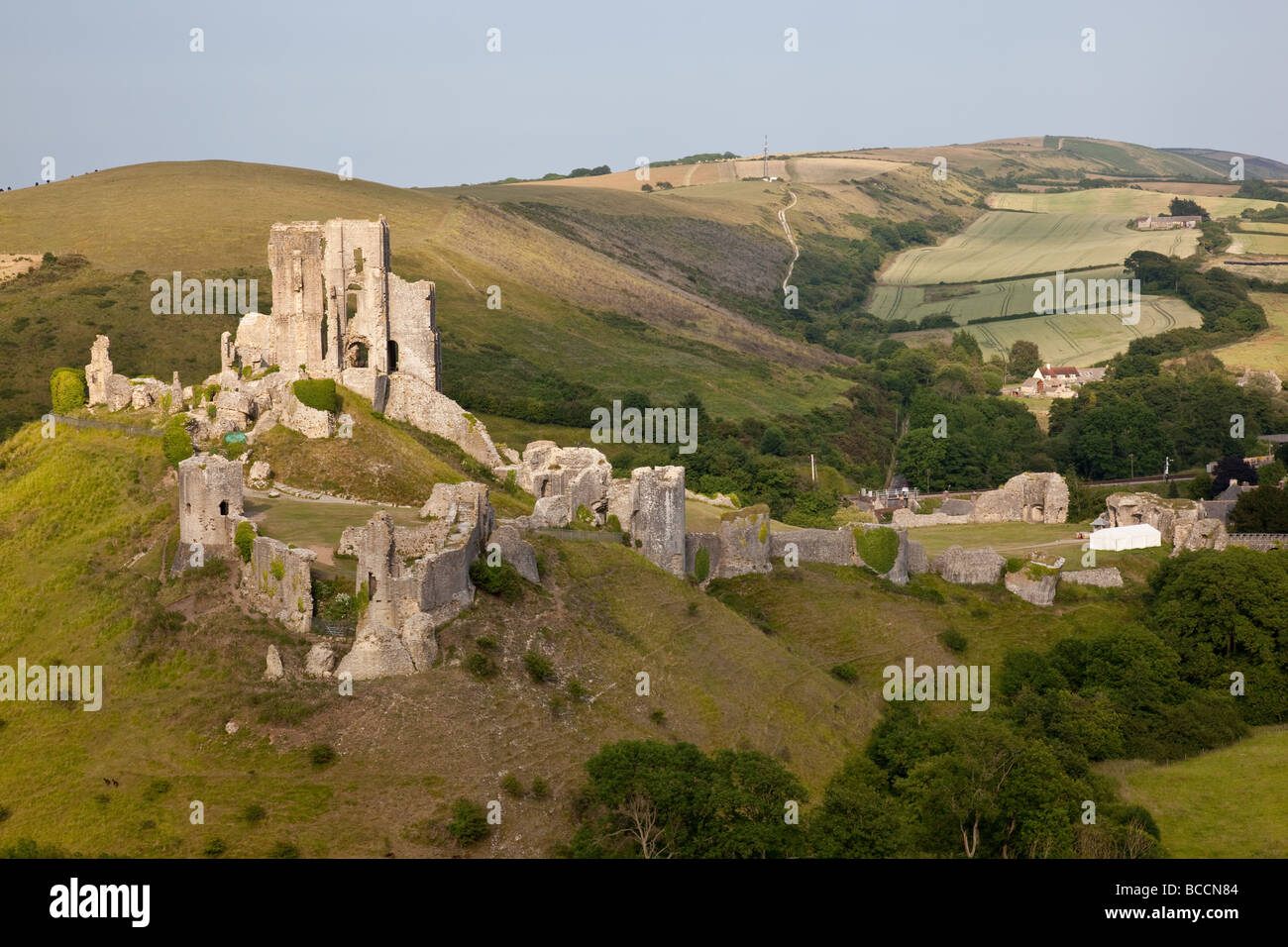 Corfe Castle as seen from the Purbeck Way footpath on the Purbeck Hills, Dorset, Engand Stock Photo