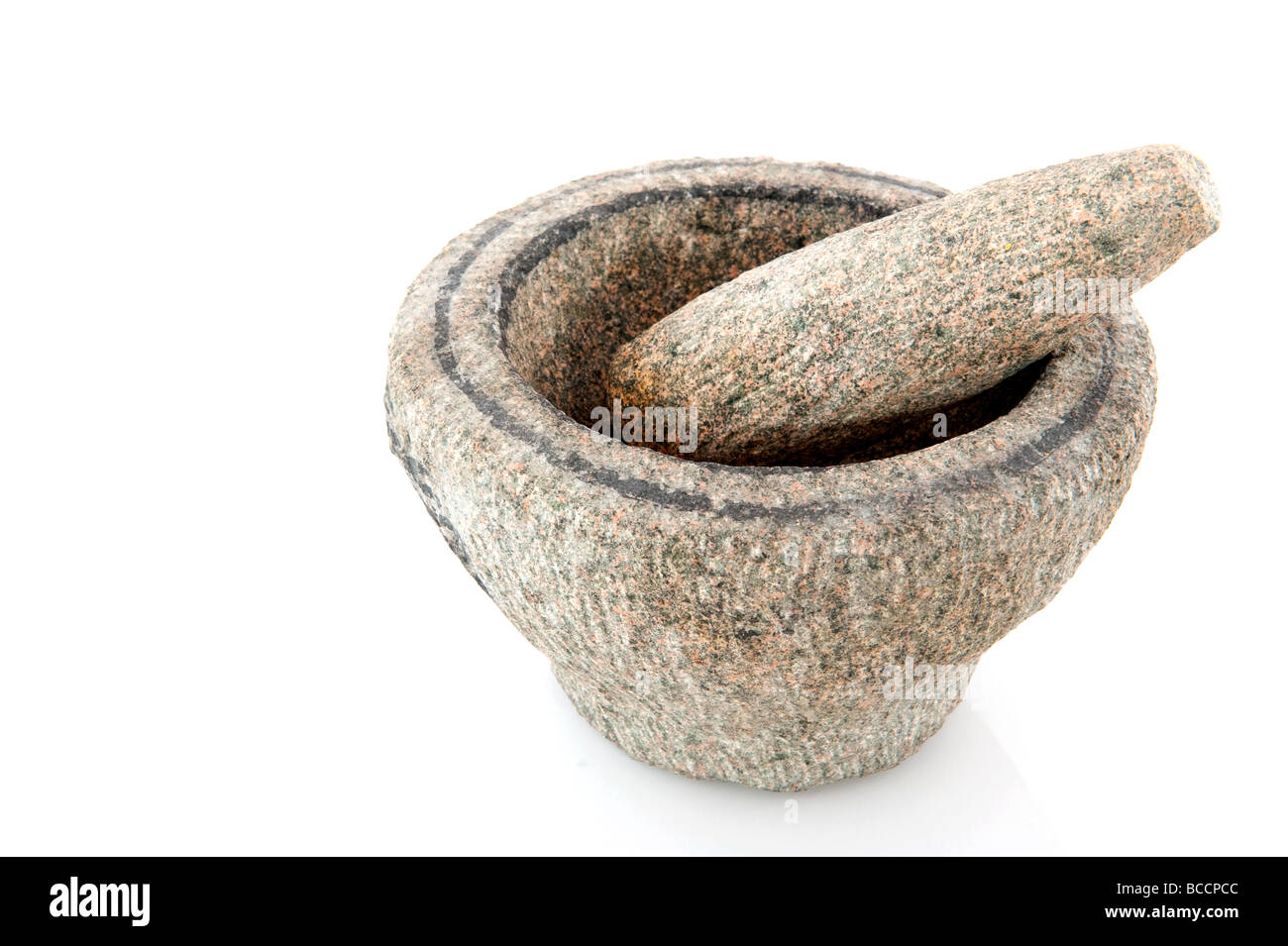 Heavy stone mortar isolated over white Stock Photo Alamy