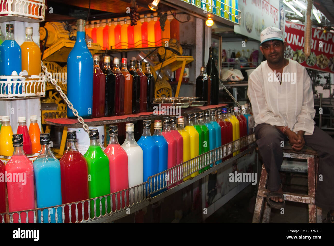 India Mumbai Bombay Chowpatty beach colourful juice bottles Stock Photo