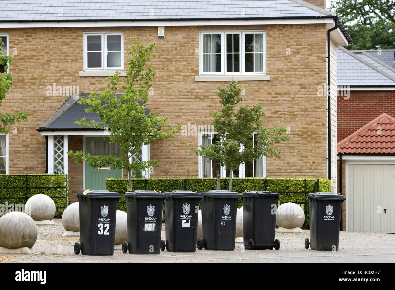 WHEELIE BINS OUTSIDE HOMES ON THE STREET Stock Photo Alamy