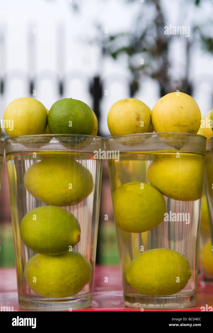 Glasses of fresh lime juice for sale at a street vendor in New Delhi India Stock Photo