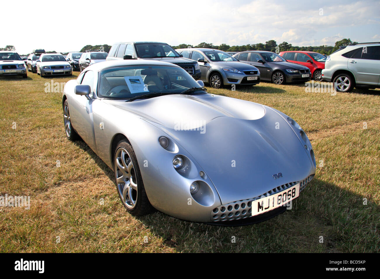 A two seat silver TVR Tuscan Speed 6 parked in the public car park at the Goodwood Festival of Speed, July 2009. Stock Photo