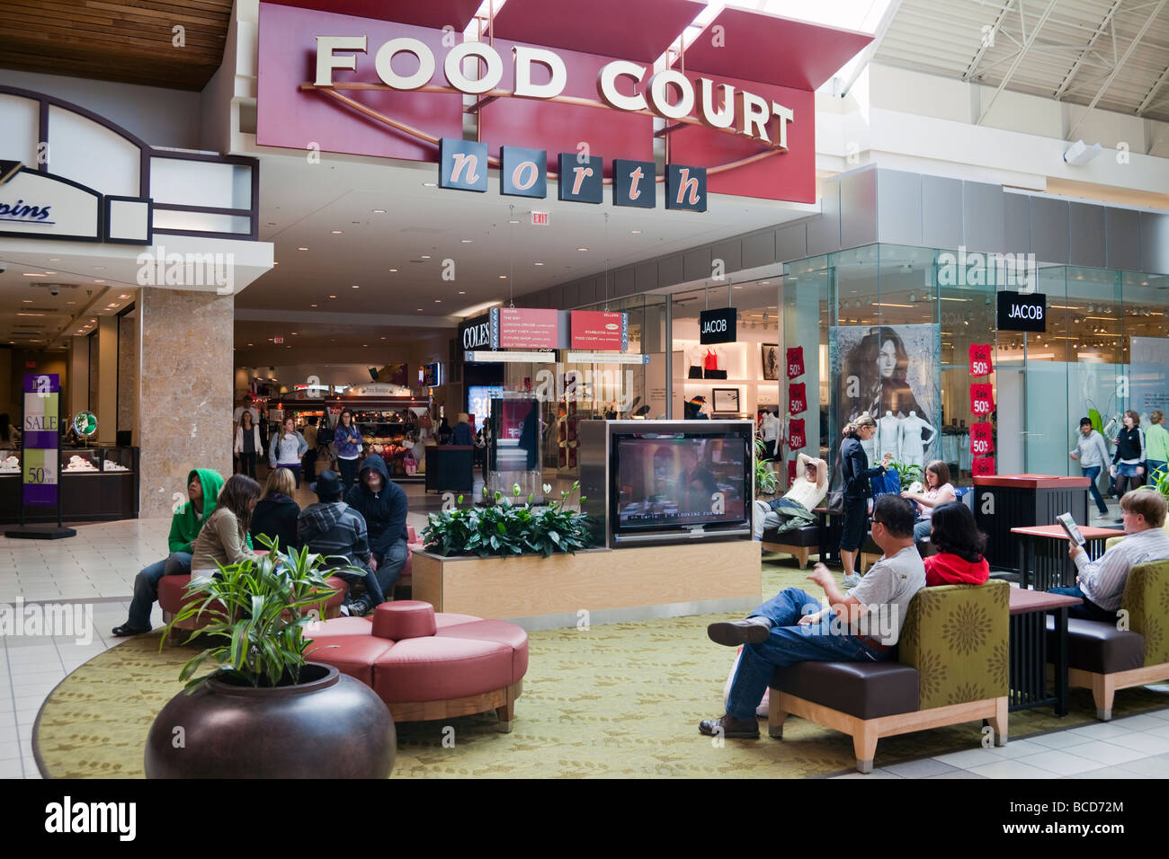shoppers relaxing, Coquitlam Centre Mall, Barnet Highway, Coquitlam, BC, Canada Stock Photo
