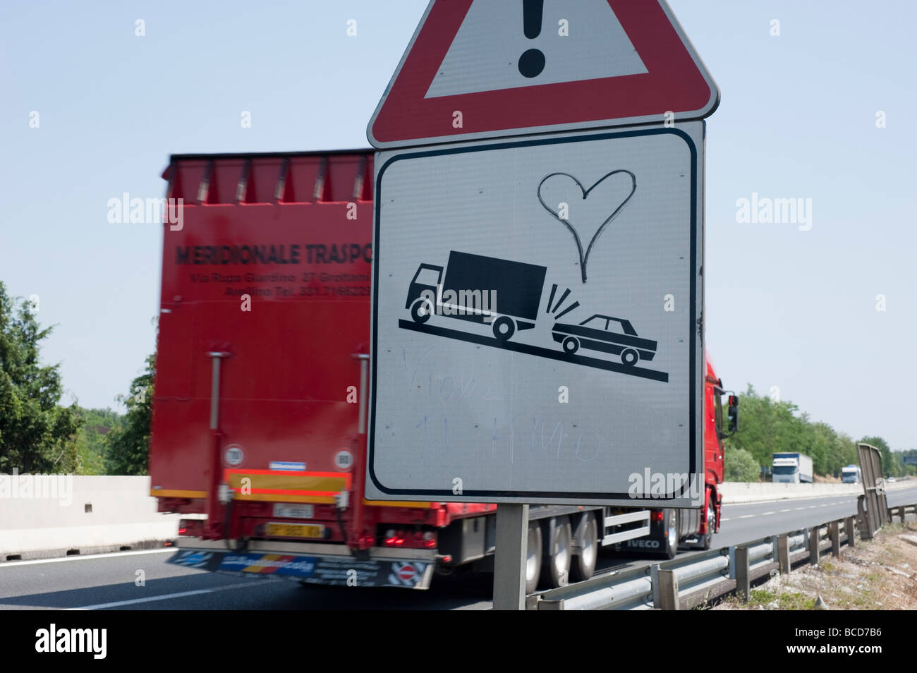 someone has drawn a heart on a traffic sign at a Freeway in Italy Europe Stock Photo