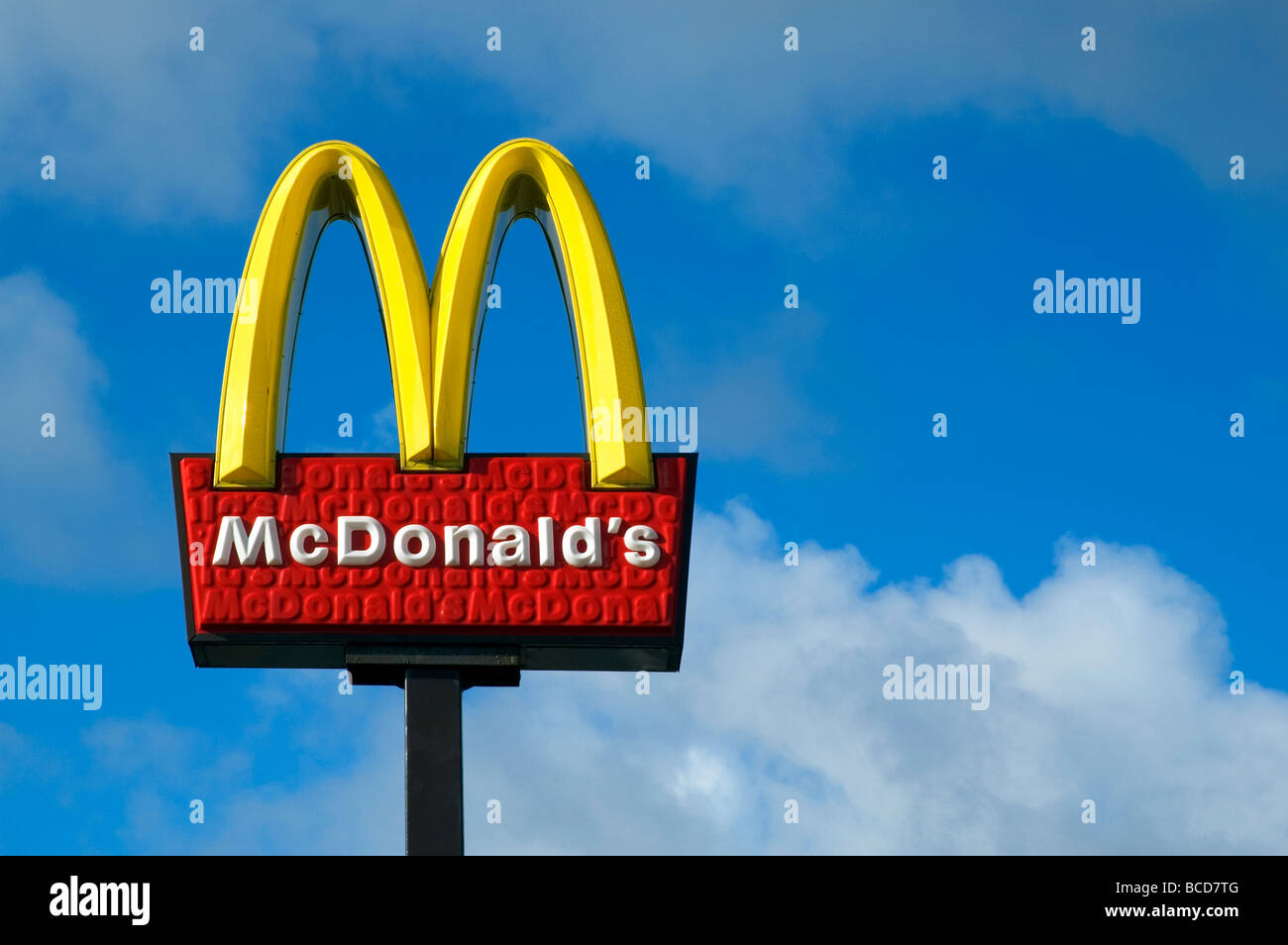 mcdonalds restaurant sign with blue sky background Stock Photo