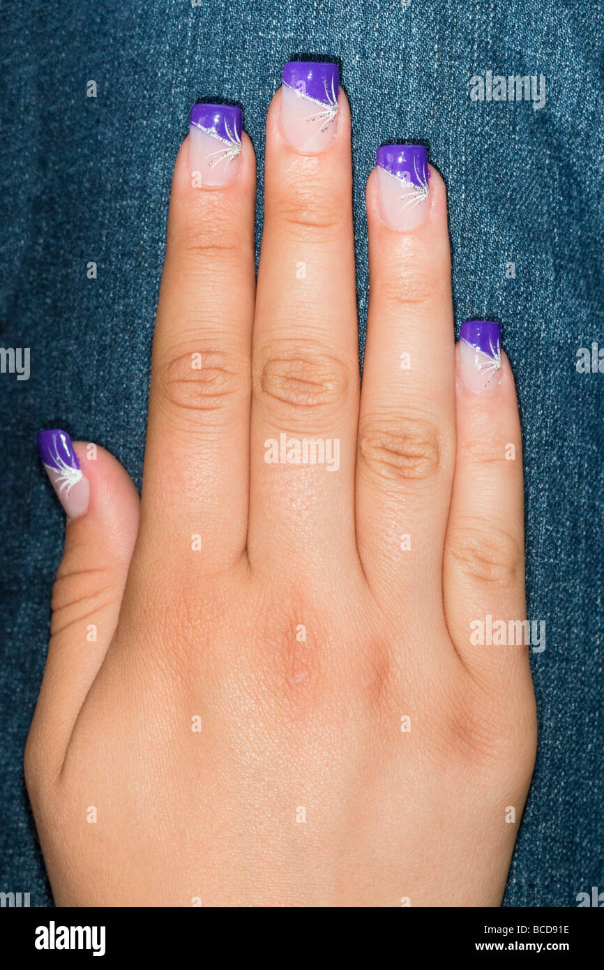 Purple acrylic nails Stock Photo