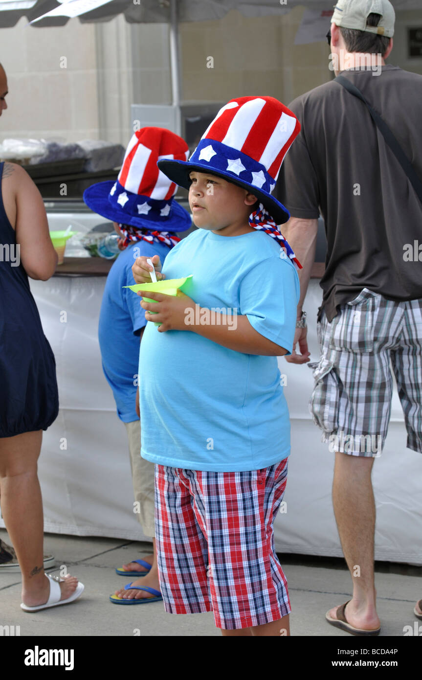 Obese children eating ice cream Stock Photo