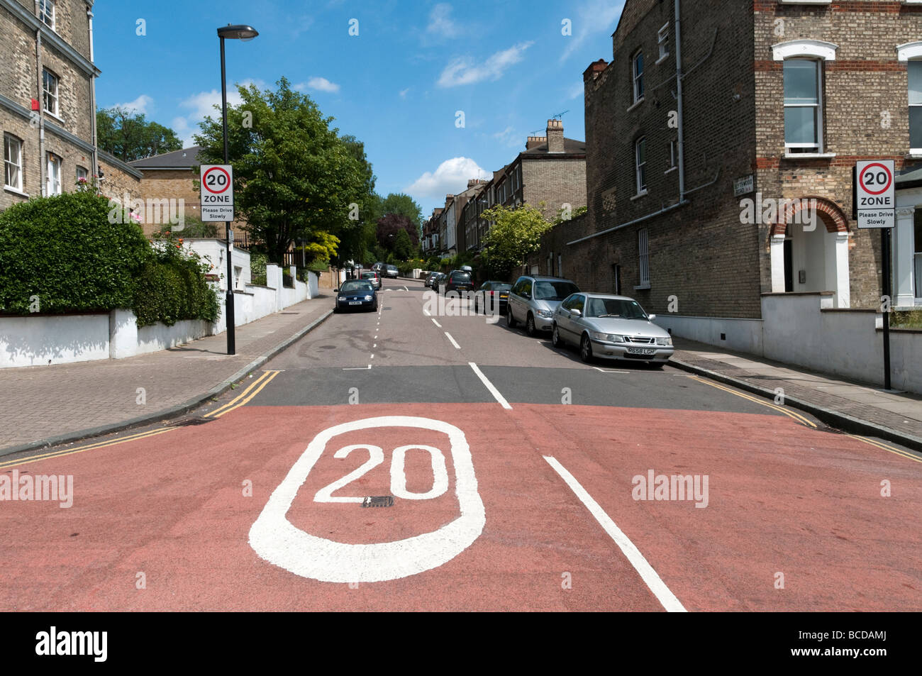 20 MPH speed limit road marking in residential street London England Britain UK Stock Photo
