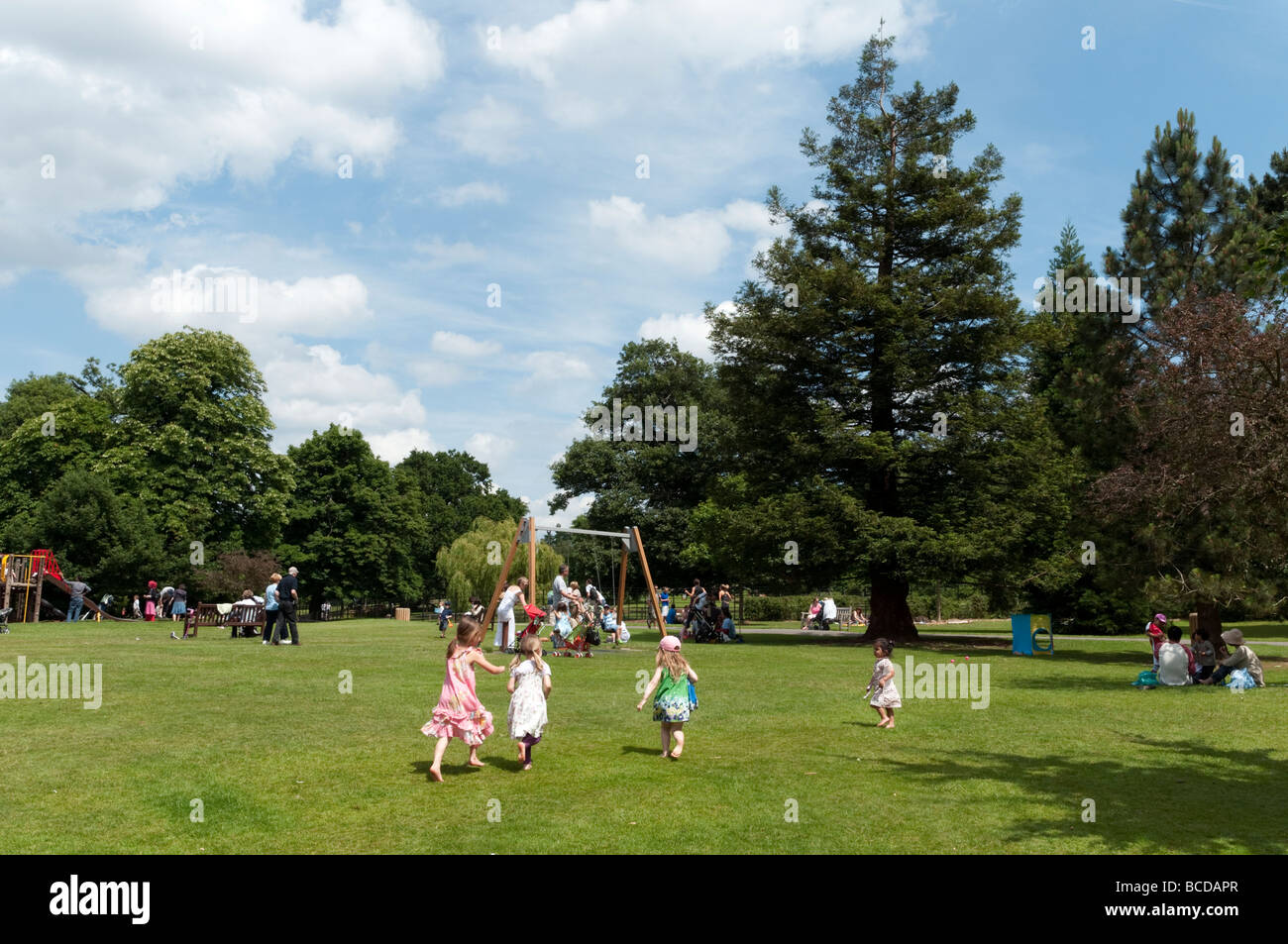 Children playing at Golders Hill Park in Golders Green, London, England, UK Stock Photo