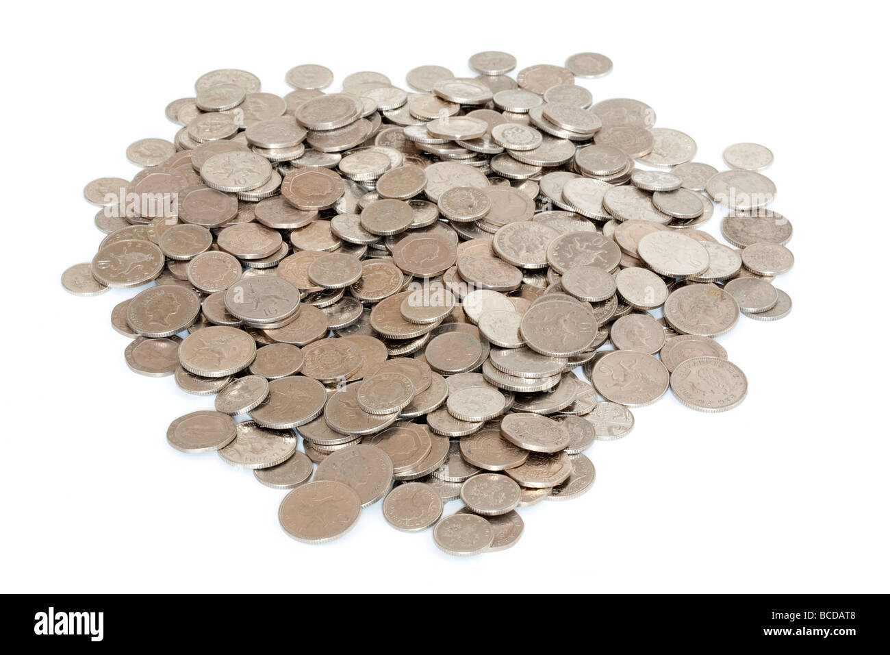 Pile of 5ps, 10ps, 20ps and 50ps - coins in UK Sterling Stock Photo