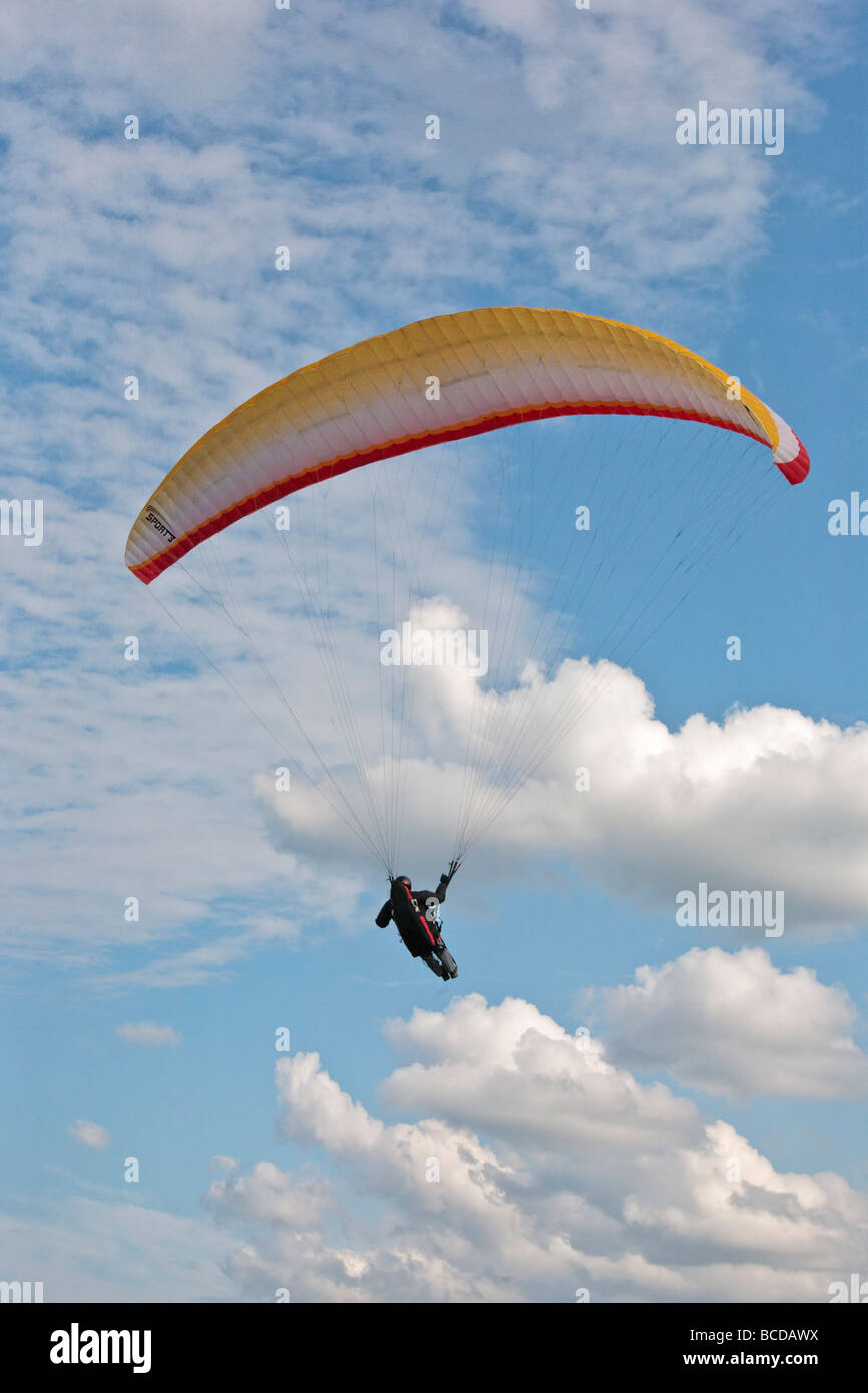 Paraglider ridge soaring over the Hole of Horcum North Yorkshire England UK Europe in the North