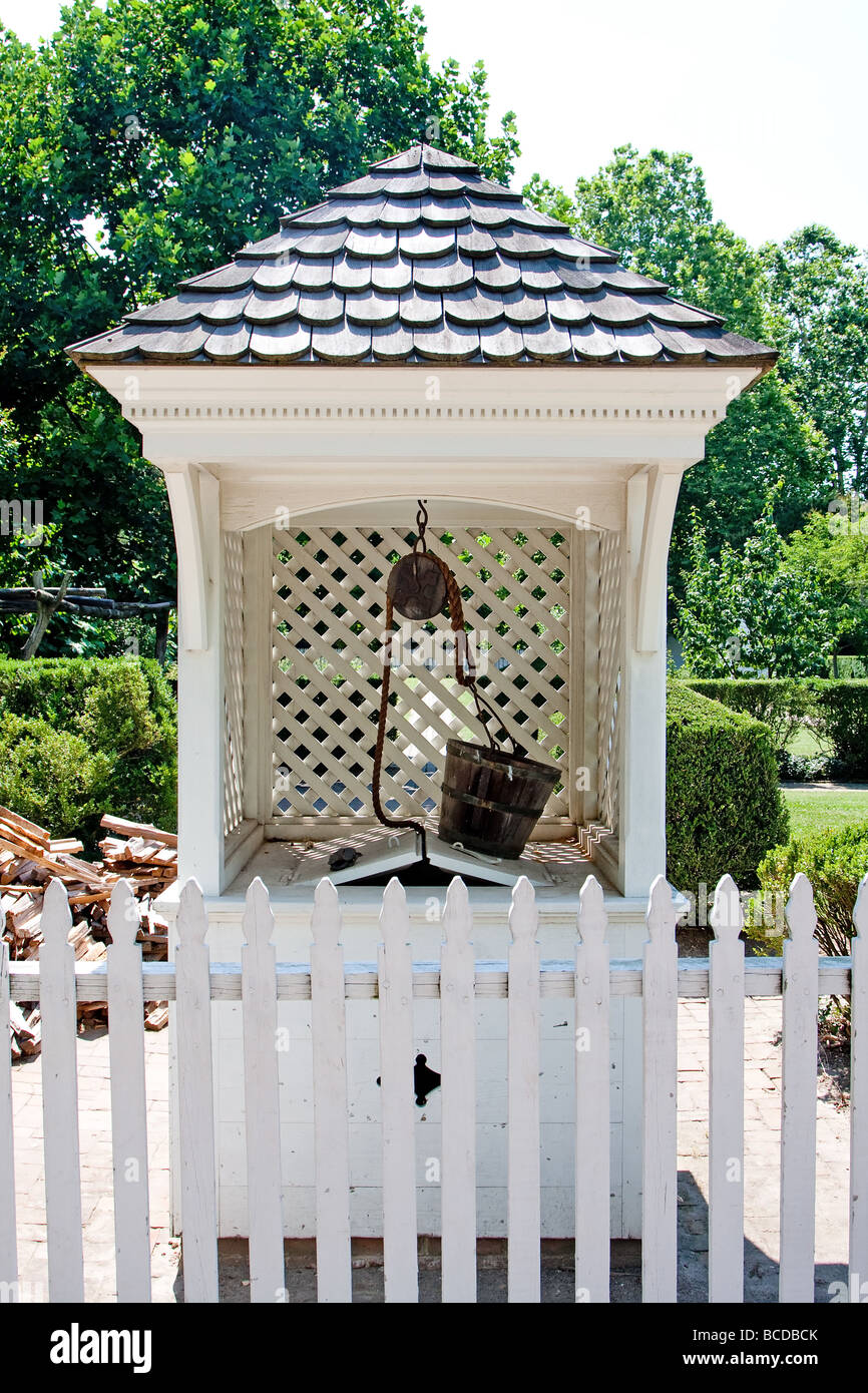 Colonial style wishing water well Stock Photo