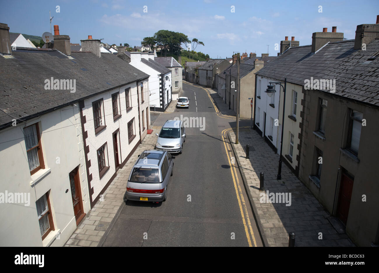small narrow street of terraced houses in carnlough village county
