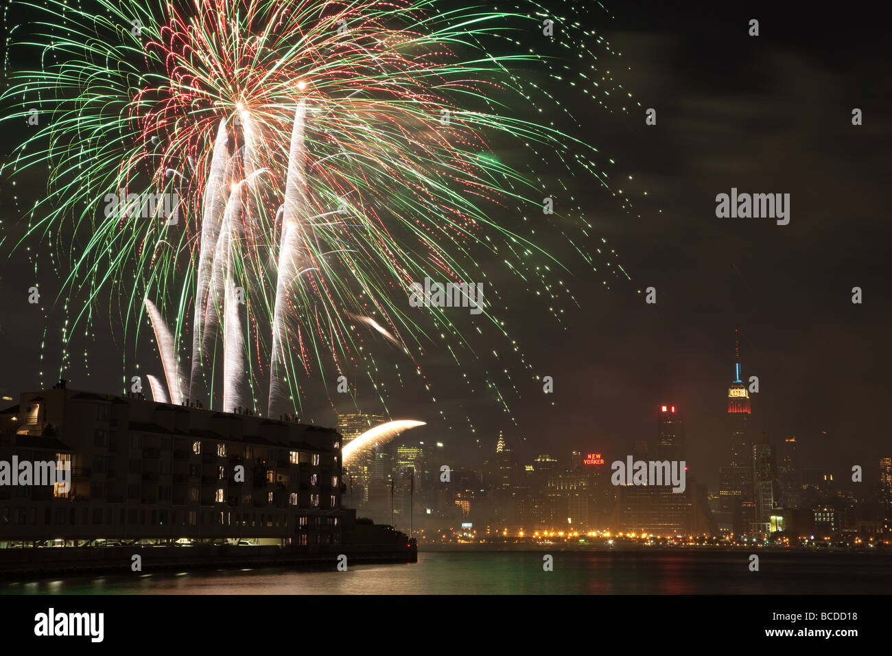 The annual Macy's Fourth of July fireworks extravaganza lights the sky over the Hudson river on July 4, 2009. Stock Photo