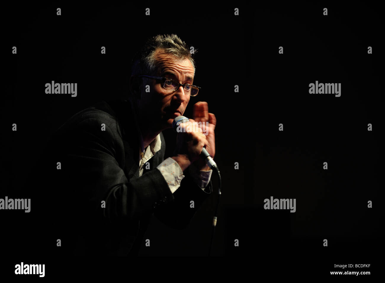 Poet John Hegley performing on stage in Brighton. Picture by Jim Holden. Stock Photo
