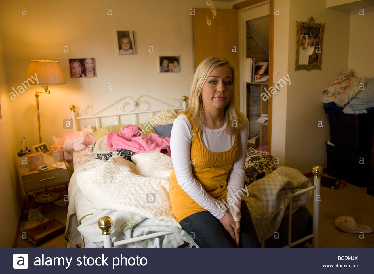23 Year Old College Student In Bedroom Stock Photos 23