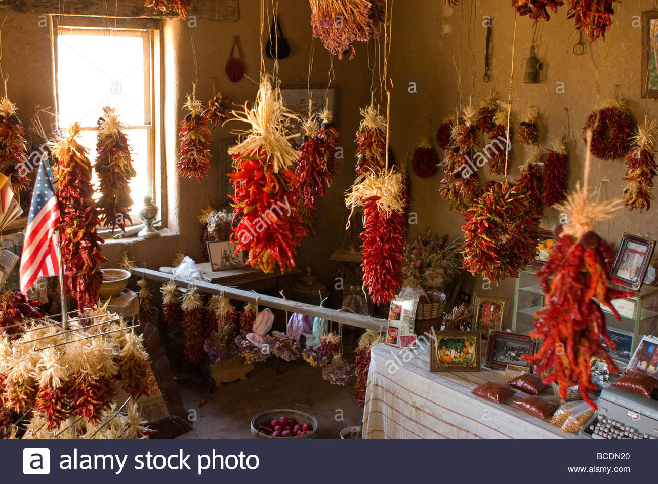 Chiles hang in a store. Stock Photo