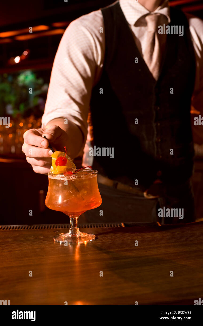 bartender making a drink at a bar Stock Photo Alamy