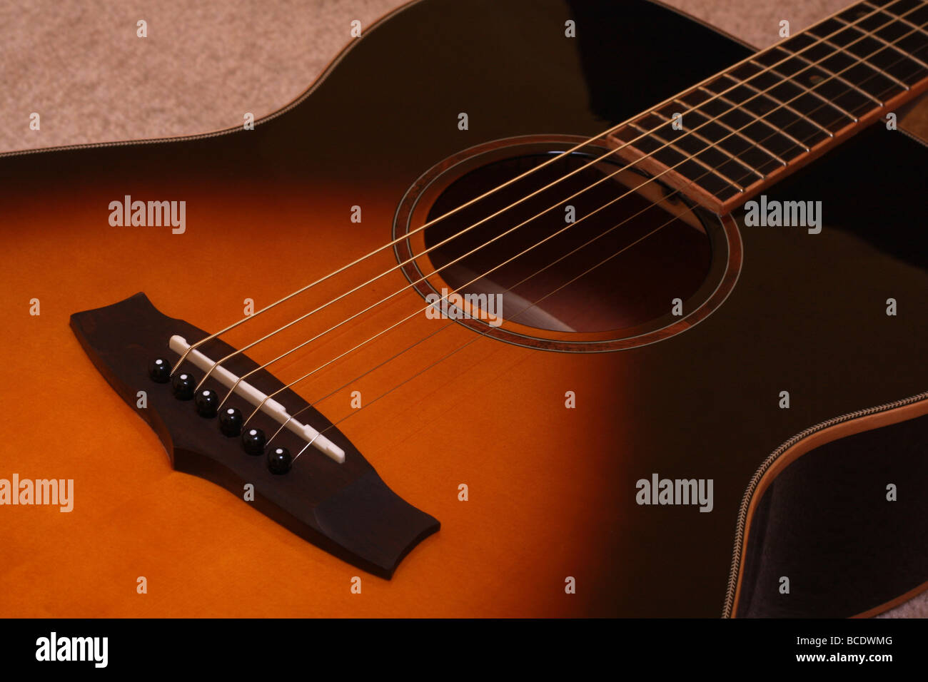 Close up of an acoustic guitar Stock Photo