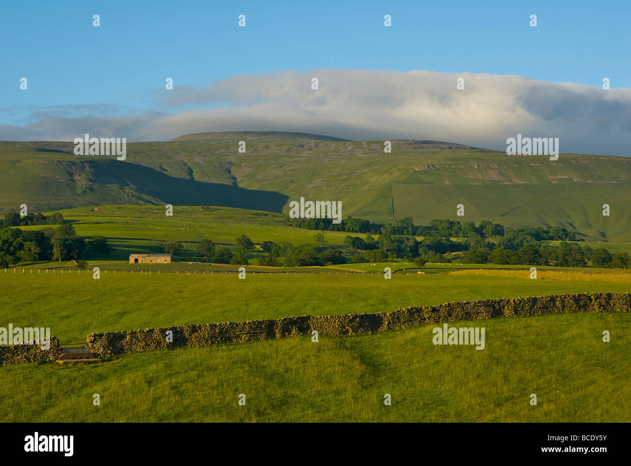 Clouds gather over Cross Fell, the highest point in the Pennines, Cumbria, England UK Stock Photo