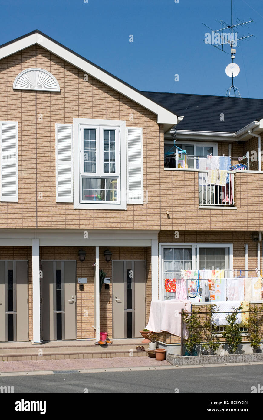 A western style multiple family two story housing unit in Japan Stock Photo