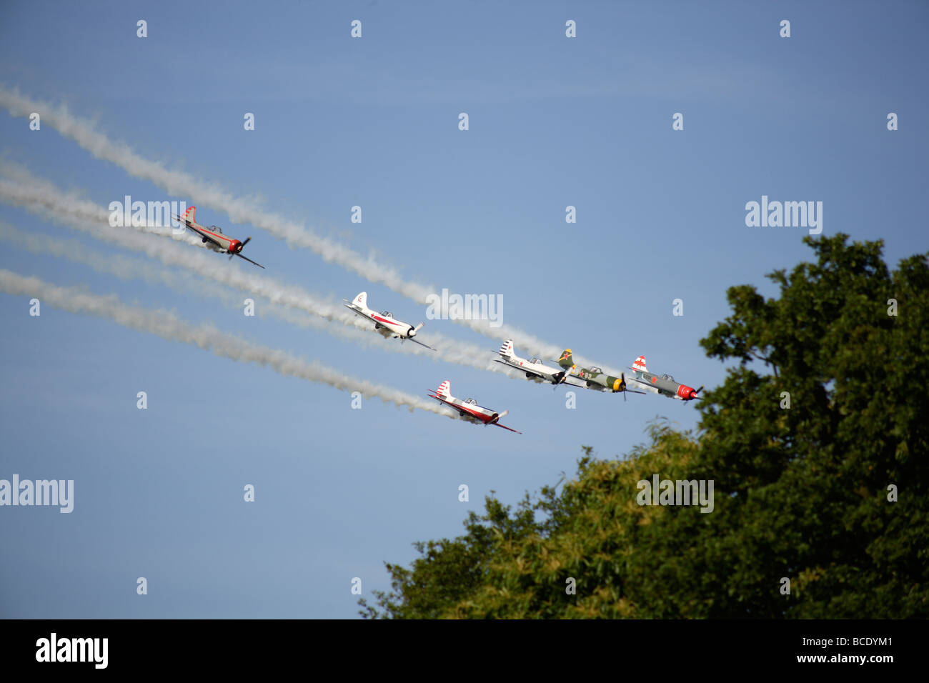 Aerobatic display of yaks in blue sky Stock Photo Alamy