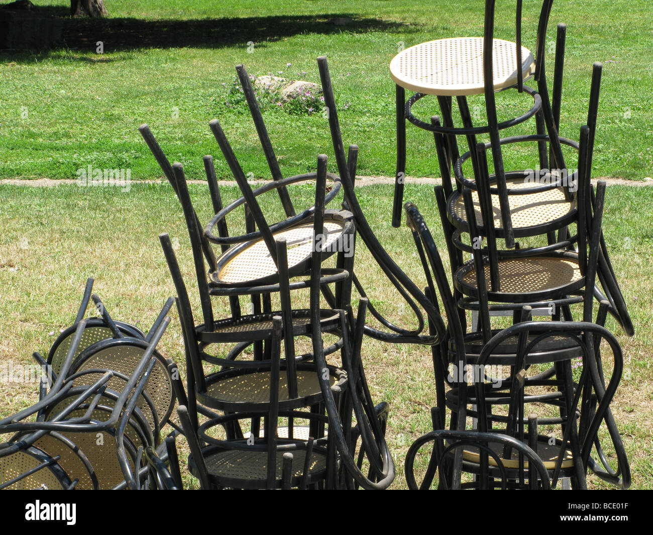 Pile Of Chairs In Field In Sun Outdoors Stock Photo 24893611 Alamy