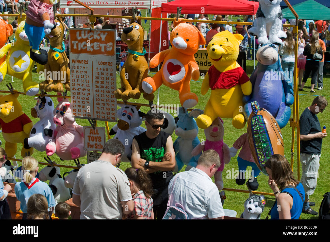 Crowds at a tombola stall Tonbridge Carnival, Kent, England. Stock Photo