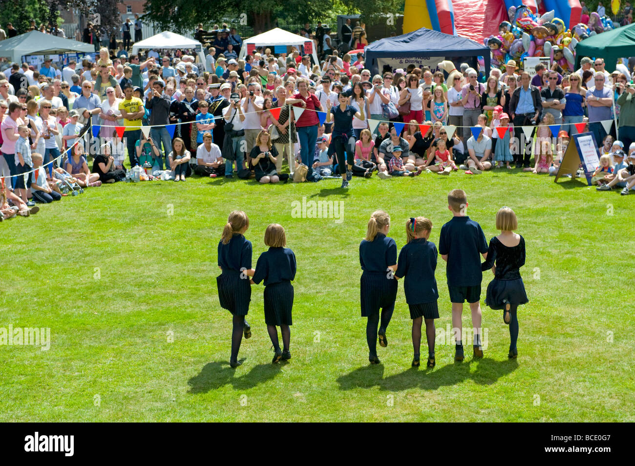 A Junior Irish Dance Group perform in front of crowds at the 2009 Tonbridge Carnival. Stock Photo