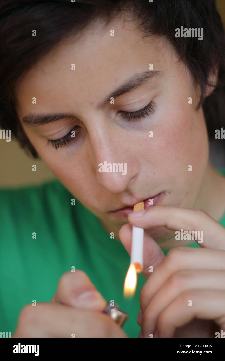 Teenager smoking Stock Photo