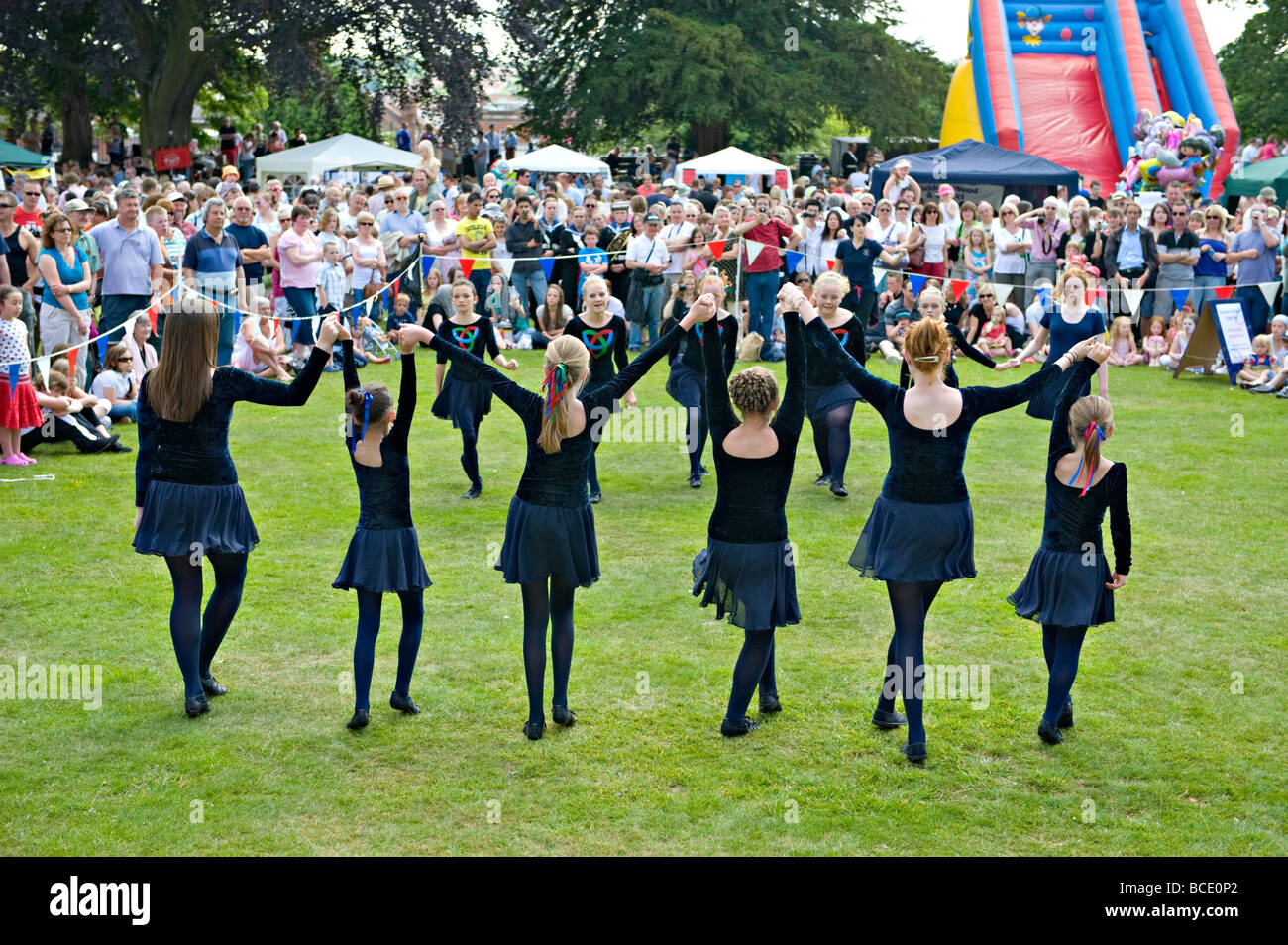 A Junior Irish Dance Group perform in front of crowds at the 2009 Tonbridge Carnival. Stock Photo