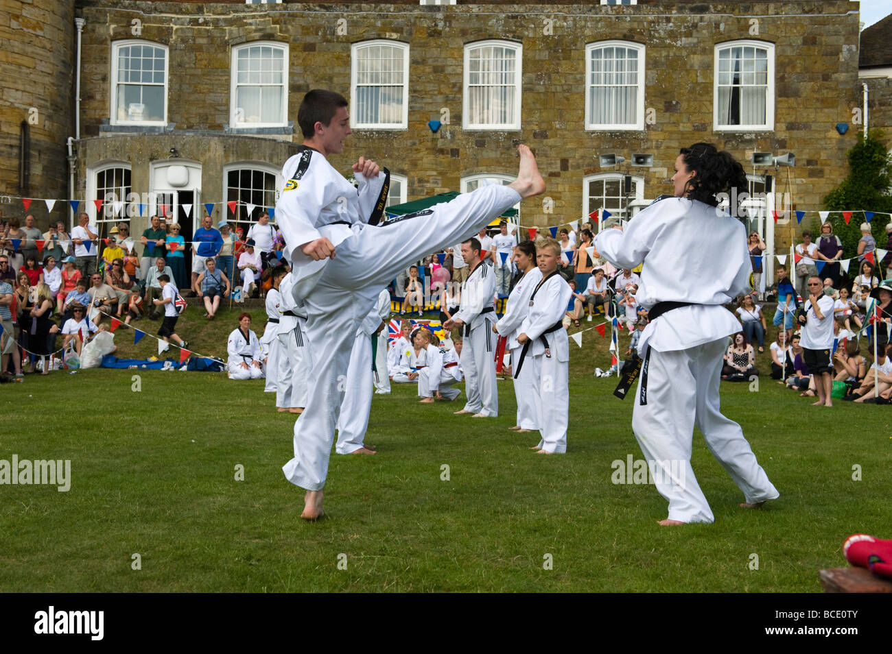 Participants show their skills during a taekwondo demonstration Stock